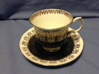 Elizabethan Footed Tea Cup & Saucer Fine Bone China England Black Gold