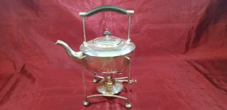 An Antique Silver Plated Spirit Kettle.  Stand And Burner.  Stamped With 3 Stars.