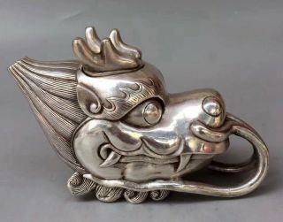 Collectable China Handwork Old Miao Silver Carve Dragon Bite Auspicious Tea Pots