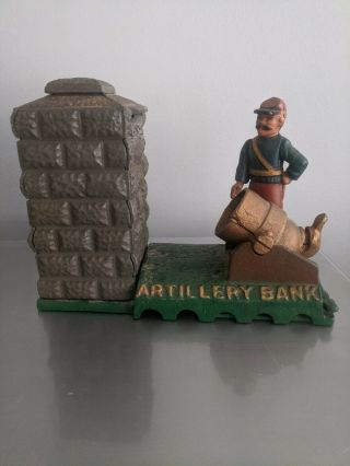 Vintage Piggy Bank - " Book Of Knowledge - Artilliary " Antique Mechanical Bank