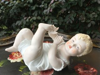 Vintage Piano Baby Bisque Porcelain Figurine Lying On Back 23/111