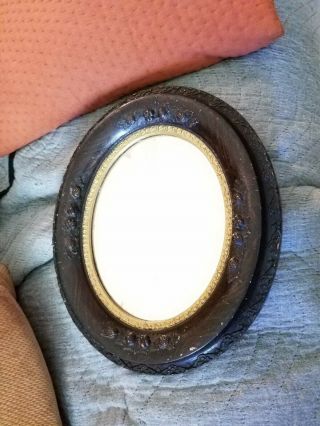 Vintage Antique Oval Faux Wood Frame Mirror.  12”x14” Antique Item