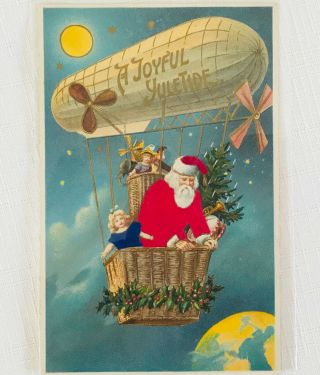 Antique Embossed Christmas Postcard - Santa Claus In Dirigible Blimp Balloon