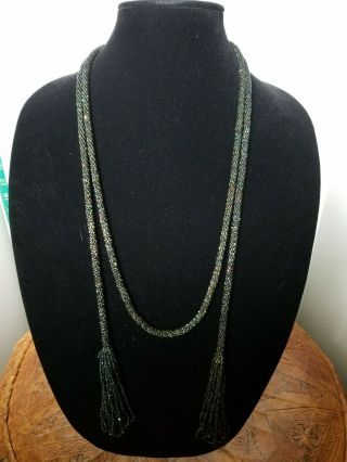 Antique Art Deco Black Irridescent Flapper Necklace.  68in Long,  34in.  Adjustable