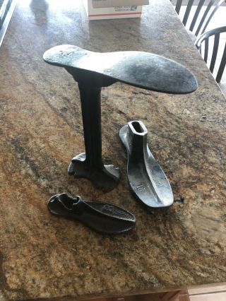 Cast Iron Shoemaker Cobbler Stand With 3 Shoes