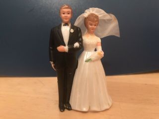 Vintage Bride And Groom Wedding Cake Topper With Trailing Fabric Veil.