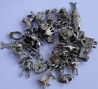 Stunning Vintage Solid Silver Charm Bracelet & 27 Charms,  Rare,  Open,  Move.  109.  4g