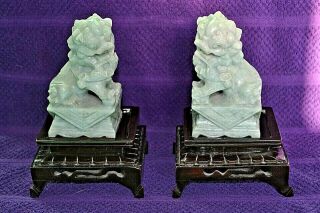 Pare Of Chinese Green Jade Stone Hand Carved Foo Dogs On Stands