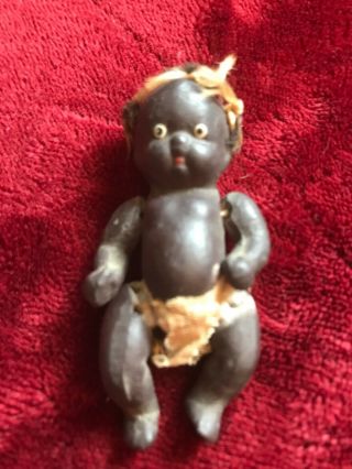 2.  5” Antique All Bisque Black Baby Doll Made In Japan