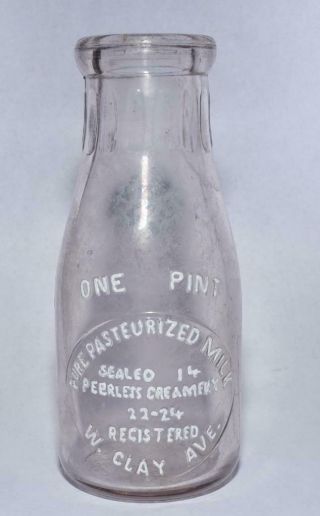 Antique Peerless Creamery - Muskegon,  Mich.  - 1 Pint Embossed Glass Milk Bottle