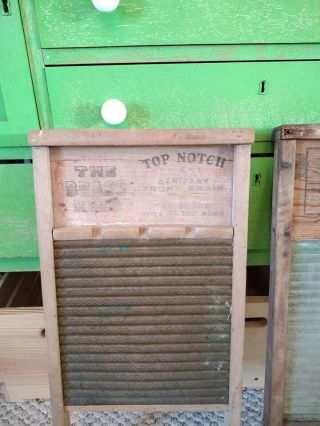 Antique Washboards.  One is glass and one is brass.  National Washboard Co.  802 2