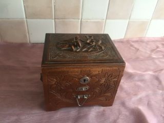 Unusual Carved Wooden Jewellery Box With A Raised Floral Design On The Lid