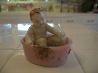 Adorable Antique Porcelain Baby Figurine Playing In A Pink Tub With Bubbles