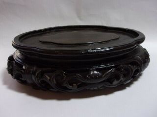 An Antique Chinese Pierced And Carved Hardwood Stand,  Oval.