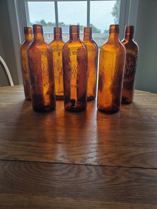 Antique 1886 Embossed Duffy Malt Whiskey Bottles,  7 Bottles Of Brown Glass