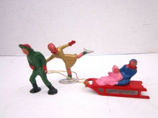 4 Pc Antique Vintage Die - Cast Metal Lead Toy Figures.  Putz Village Sled,  Skater