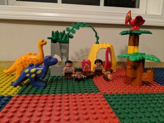 Vintage Duplo Lego Includes 3 Dinosaurs And 4 Piece Caveman Family,  Accessories