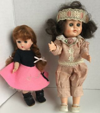 Two Vintage Hard Plastic Fashion Dolls In Period Outfits,  Flapper & Poodle Skirt