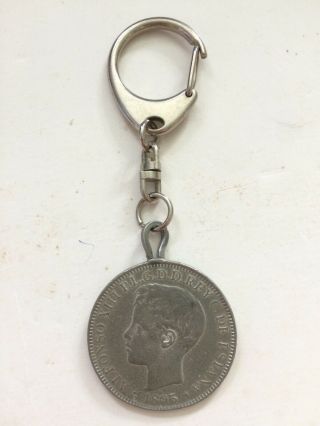 Puerto Rico.  1 Peso Coin 1895.  Lead Key Chain.