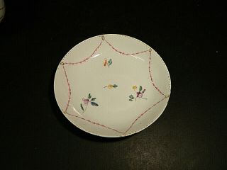 Chelsea Derby Porcelain tea bowl and saucer in rare pattern c.  1780.  Puce mark 3