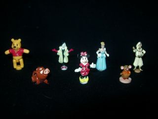 Polly Pocket Seven Disney Figures (lion King,  Cinderella,  Dalmatian,  Minnie