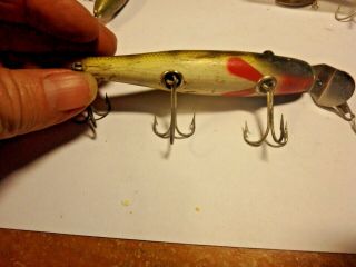 5 fishing lures - unmarked - the red and white are wood last one marked CREE??? 2