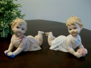 Pair 2 Vintage Bisque Piano Baby Girl & Boy 4.  5 " Long