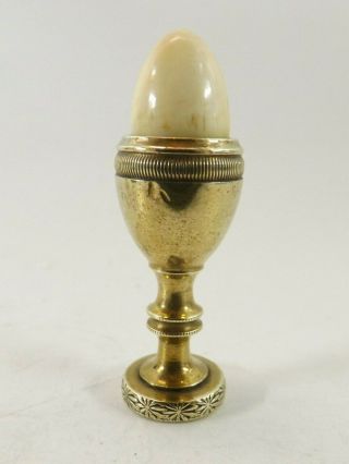 19th Century Toothpick In Form Of An Egg In A Brass Egg Cup 4.  5cm Long Ref109/2