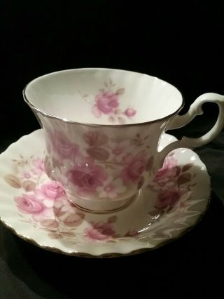 Royal Albert Tea Cup And Saucer Pink Roses With Gold Trim.