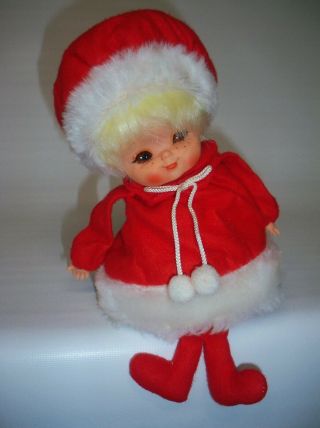 Vintage Animated Wind Up Music Box Plush Christmas Baby Doll Sitting On A Shelf