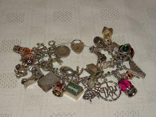 Vintage Solid Silver Charm Bracelet - 106 Grams - 27 Charms - Some Rare