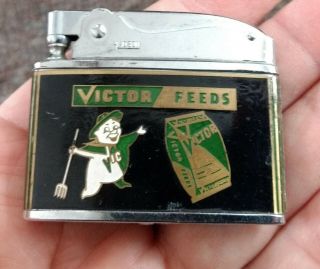 Rare 1950s Victor Feeds Dealer Cigarette Lighter.  Omaha,  Nebraska