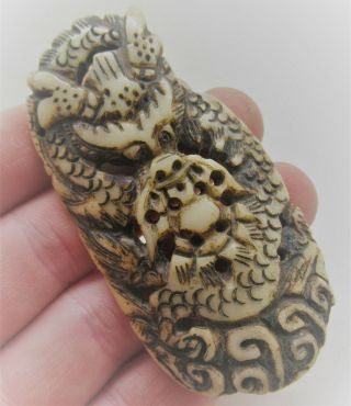 Very Interesting Old Antique Chinese B0ne Carved Amulet Depicting Dragon Heads
