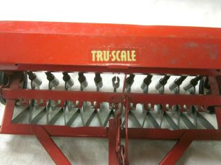 Vintage Tru Scale,  1/16 pressed steel,  tractor trailer.  Disk plow,  seeder.  Rare 2