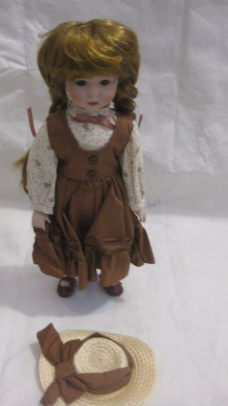 Rare Collectible Porcelain Doll Little Girl In A Brown Dress From Dynasty Doll