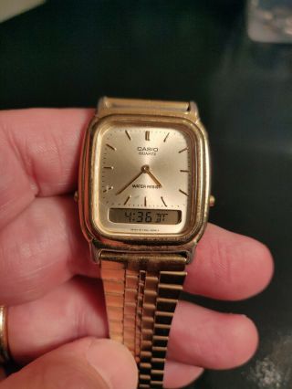 Vintage Casio Aq - 307 Model Men’s Wrist Watch Gold Tone Analog Digital Running
