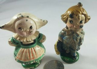 Two Rare Vintage Hubley Dolly Dingle Cast Iron Paperweights.  Boy And Girl
