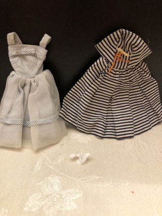 Two Vintage Barbie Dresses And White Shoes