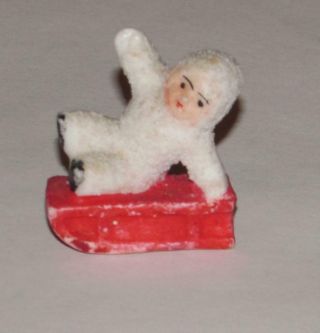 Antique German Bisque Snowbaby Snow Baby On Red Sled Figurine Miniature Germany