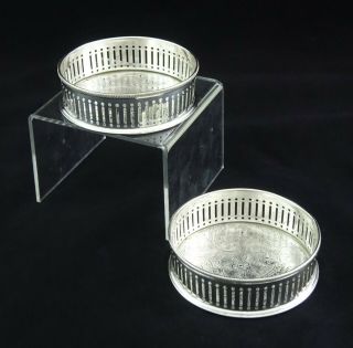 Pair Vintage Art Deco Silver Plated On Copper Chased Wine Bottle Sauce Coasters