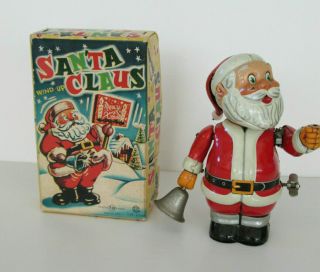 1957 Japan Tn 6 Inch Santa Claus " Merry Xmas " Tin Windup In Orig Box.  Rare