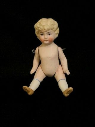 Antique Miniature 4 " Bisque Doll,  Wire Jointed,  Blond Molded Hair