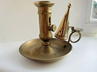 Antique brass chamber stick with thumb holder and candle snuff & pusher 2