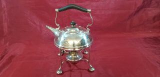An Antique Silver Plated Spirit Kettle And Stand By William Suckling
