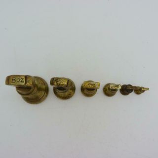 SET OF SIX ANTIQUE BRASS WEIGHTS 8oz to 1/4\oz 2