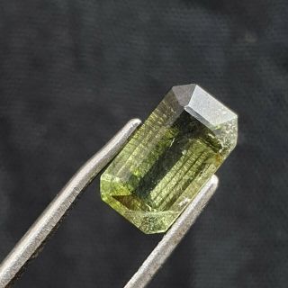 1.  62ct Rare Needles Inide Lustrous Transparent Peridot Top Cut Gemstone@pak