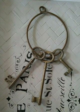 Set Of 3 Vintage Brass Skeleton Keys W/ Large Antique Brass Key Ring Decor