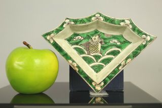 A Chinese Kangxi Period (1662 - 1722) Biscuit Glazed Famille Verte Dish