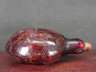 Chinese Carp On Tortoise Carved Red Peking Glass Snuff Bottle