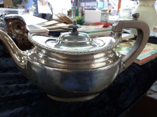 Silver Coloured Metal Teapot.  Unusual Shape